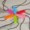 GRYZAK DLA DZIECKA LOGOPEDYCZNY ZABAWKA SENSORYCZNA NASZYJNIK ŻÓŁTY KLOCEK